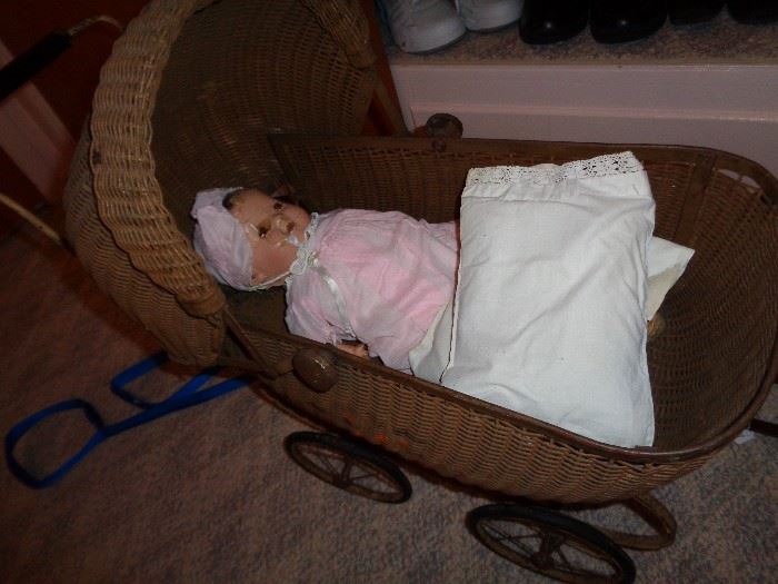 Antique doll and wicker buggy/trolley ... priced separate