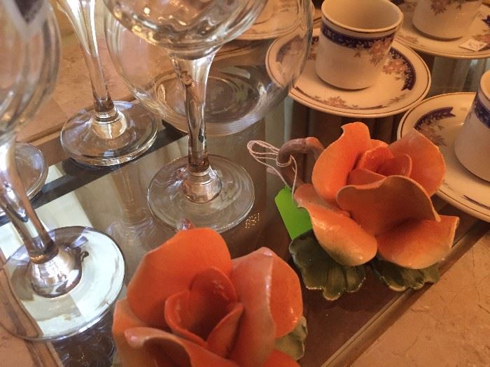 Porcelain flowers, wine glasses, cup and saucer sets