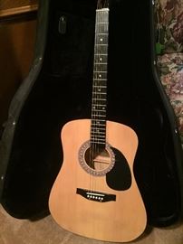 Acoustic guitar with case  