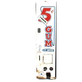 Vintage 5 Cent Gum Dispenser: A vintage 5 cent gum and lifesaver dispenser. This piece features a white painted front. It has two two levers. Vending machine was manufactured by Sherman Mfg Co. in Los Angeles.