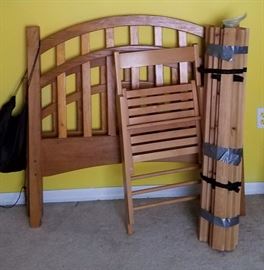 One of two twin beds or half of a bunk bed set