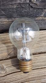 vintage socket and aerolux lightbulb with cross filament 
