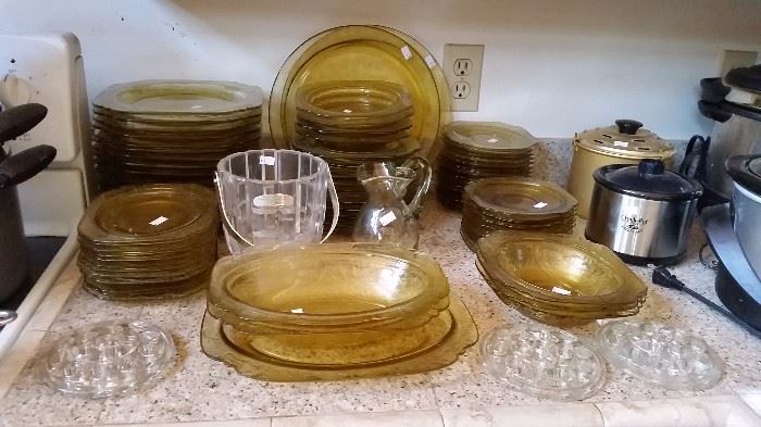 amber and brown glassware, crockpots and clear glass