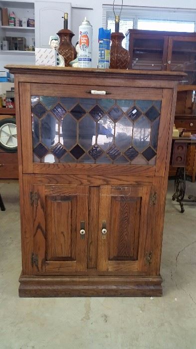 oak and stained glass bar