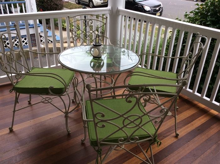 Wrought Iron Glass-Top Table with Four Chairs