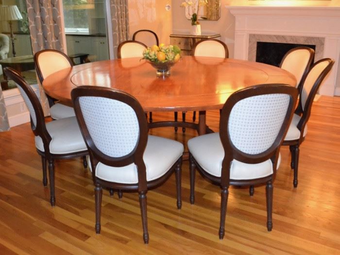 Custom round dining table with 10 chairs
