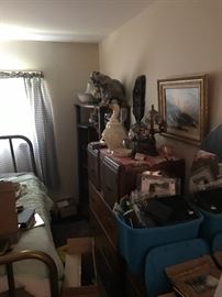 HERE WE HAVE AN ANTIQUE METAL BED, ANTIQUE SECRETARY, AND MANY NEW ITEMS IN THE BOXES
