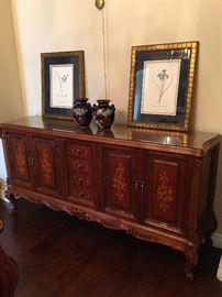 Italian buffet. 68"x17"x34"                                                                            thick solid wood marquetry/carved buffet cabinet       
w/ glass top. excellent condition.                                           matching with next dining table and 2 curios.                                        