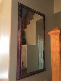 wood framed, beveled wall mirror. 37 x 67