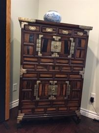 Asian antique paulownia wood side cabinet w/brass embellishment.    L36x W16 x H53.  top and bottom 2parts