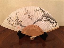 water color drawing on the folding fan