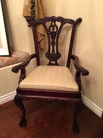 2 solid wood arm chairs with new upholstery.                   beautiful antiques