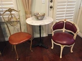 marble topped round table w/wrought iron pedestal                          gilt iron framed chair                                                                       cozy wood side chair                                                                        Chinese fish bowl