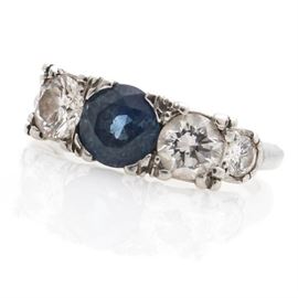 Platinum 1.20 Carat Sapphire and 1.06 CTW Diamond Ring: A platinum 1.20 ct sapphire and 1.06 ctw diamond ring.
