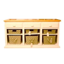 Martin Furniture Maple and Painted Console with Woven Baskets: A maple and painted console with woven baskets. The console features a finished maple top with routed edges and mitered corners. The storage below consists of three drawers with bin pulls, painted to match and adjustable shelving. Included are six two-tone fabric baskets that fit the spaces. Companion pieces are listed under 17BOS108-082 and 17BOS108-024.