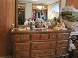 dresser & sacred heart of Jesus statue