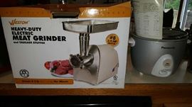 Heavy duty electric meat grinder by Weston