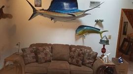 sofa with taxidermy fish
