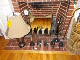lamp, mirrored fireplace screen, basket of canes