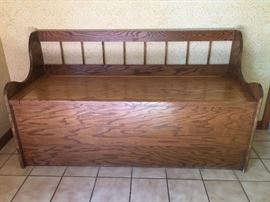 Solid Oak Deacon's Bench. 54" X 20". Seat lifts up for abundant storage.