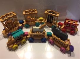 Charming wood circus train set with removable wooden animals. 62" long.
