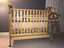 Matching crib with linens