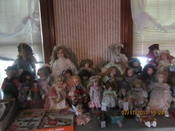 The doll collection includes fashion dolls and baby dolls and cloth dolls. 
