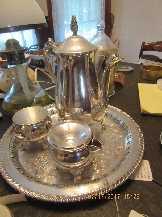 silver plate tea set. One set is Reed & Barton. 