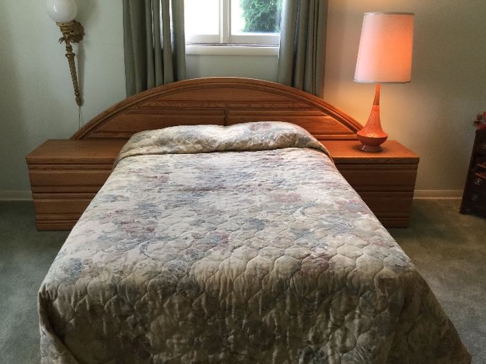 queen bed and matching oak headboard with attached night stands