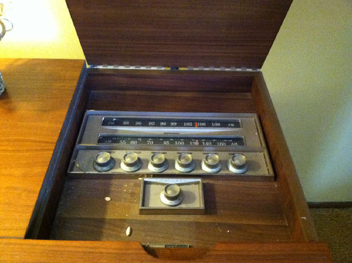 Motorola console ,record player is in excellent working condition. Teak cabinet is by derexel heritage.