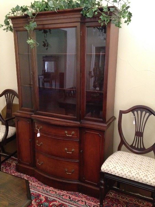 Duncan Phyfe china cabinet; host chair and side chair sold separately 