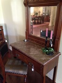 Antique marble-top Eastlake vanity with mirror; antique chair 