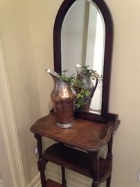 Small table; decorative mirror