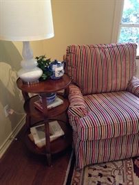 Extra comfortable striped swival club chair; 3-tier side table; 1 of many great lamps