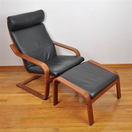 Contemporary Ikea "Poäng" Leather Chair and Ottoman: A contemporary Ikea Poäng leather chair and ottoman. The engineered beech chair frame features a cushioned back and seat in black leather flanked by open, bentwood arms. The arms continue to a bentwood base joined by stretchers. Accompanying the chair is a matching ottoman with a black leather cushion.