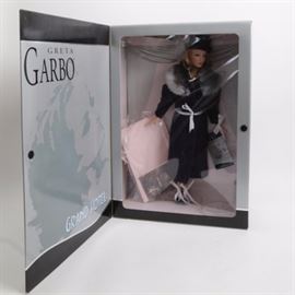 Limited Edition Madame Alexander Greta Garbo "Grand Hotel" Doll: A limited edition Greta Garbo Grand Hotel doll, circa 2002. This porcelain doll is limited edition number 0770 out of a release of 1500 and depicts the iconic Greta Garbo in the 1932 film. Presents unopened in its original box with attached tag and Certificate of Authenticity.
