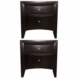 Contemporary Dark Espresso Nightstands: A pair of contemporary nightstands. The nightstands are made of hardwood that features a dark espresso finish. The nightstands features two drawers each for storage and is adorned with satin nickel knobs. This piece coordinates with items 17CLT086-043 and 17CLT086-042.