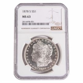 NGC Graded 1878 S Morgan Silver Dollar: An 1878 S silver Morgan dollar graded MS 63 by NGC. Designer: George T. Morgan. Mintage: 9,774,000. Metal Content: 90% silver, 10% copper. Diameter: 38.1 mm. Weight: approximately 26 grams.