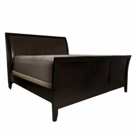 Leather Accented King Size Sleigh Bed: A modern king size leather accented sleigh bed. This bed features a chocolate leather headboard and black wood headboard with matching black footboard. The bed includes the rails.