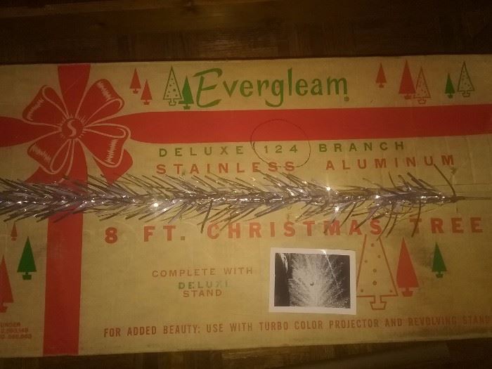 The Evergleam  deluxe 124 branch stainless aluminum 8 foot Christmas tree...excellent condition. Each branch in original individual paper sleeve..in original box..all excellent condition.