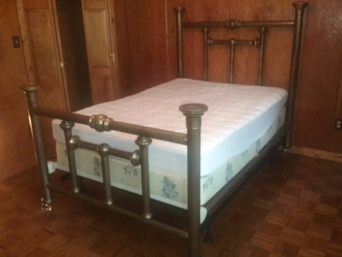 125 year old brass bed with mattress.. box springs.. ...new Eddie Bauer cover