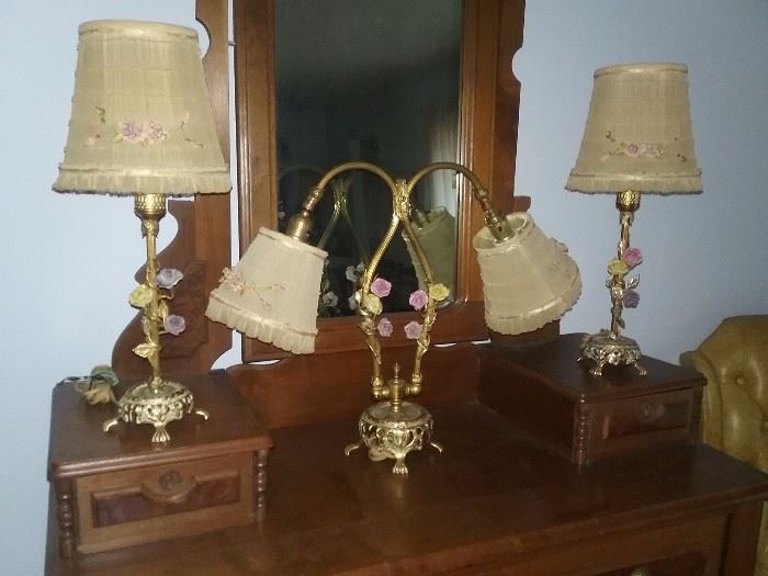 Antique set of FIVE 1920 French lamps... "EC 160 Made in France"...solid brass...lavender ..yellow...pink..porcelain roses...original silk shades with hand made silk roses..all working condition
