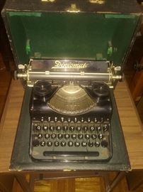 Antique Diplomat typewriter  with case..two vintage wood/metal typewriter tables on wheels  with pop up side extensions