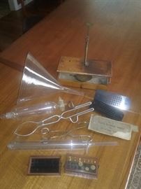 Scale with drawer.. large glass funnel..glass lab tubes..tube holders..hard rubber mold for tablets..dram weight set in lidded box...Antique medical..laboratory..chemist ..pharmacy items