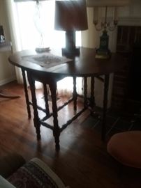 Antique gate leg table with drawer..