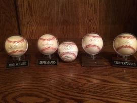 Signed Yogi Berra, Mike Schmidt, Chipper Jones, and Ernie Banks 