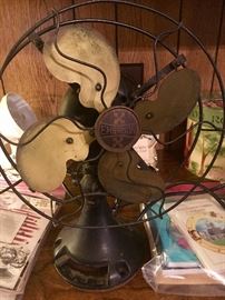 Emerson oscillating fan #29645 with tilt head and brass blades. It works!!