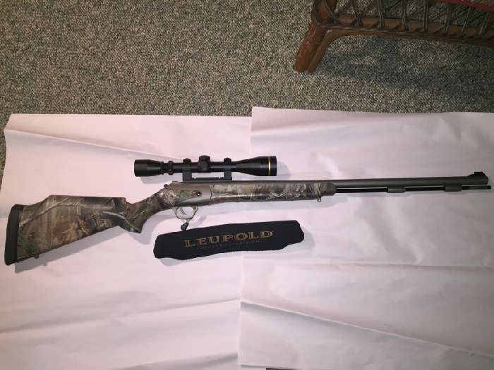THOMPSON CENTER- MUZZLE LOADER WITH LEUPOLD SCOPE
