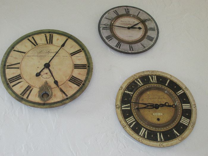 Several ornate wall clocks