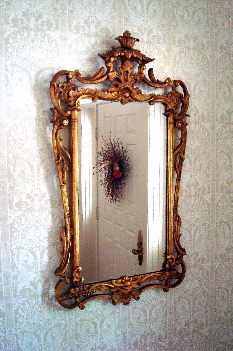 Ornate vintage 1920's gilt wall mirror.